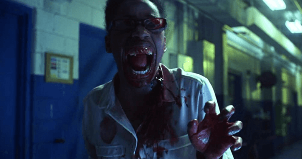 A Black, female vampire screaming with bloody fangs.